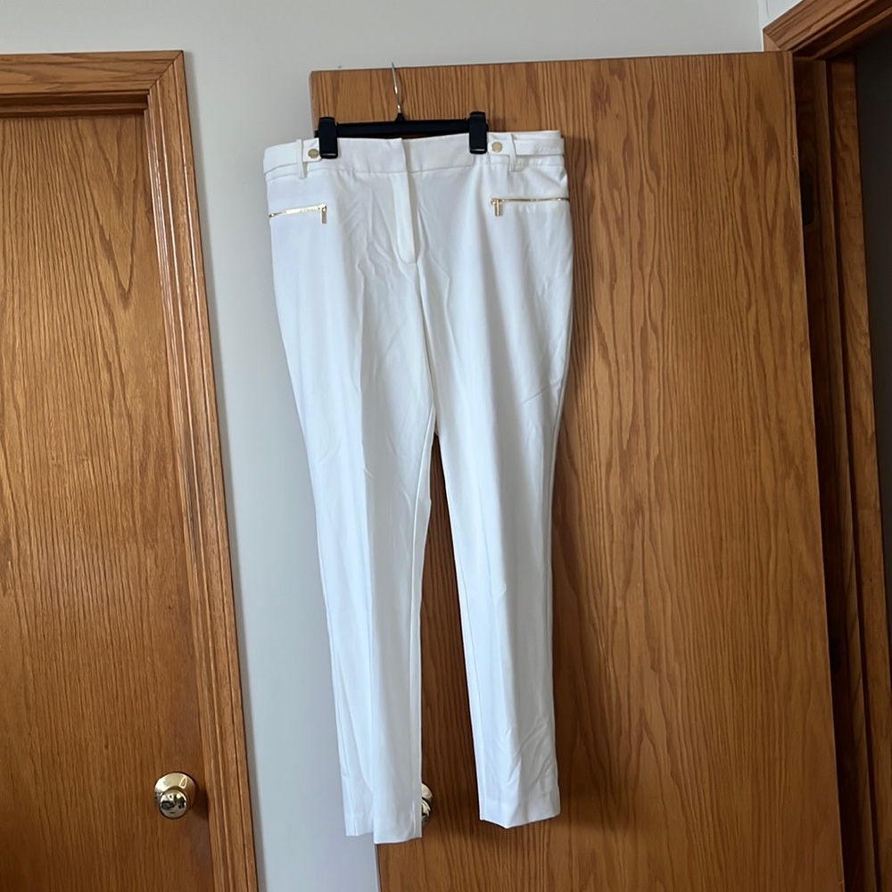 Calvin Klein white pants.
